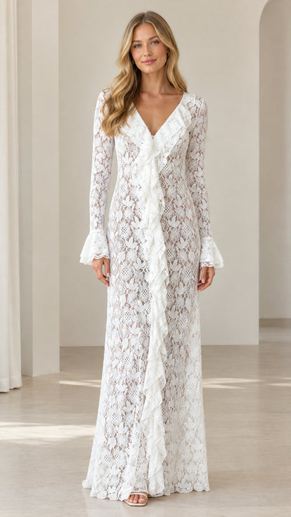 Front view of woman wearing white floral lace V-neck ruffle maxi dress