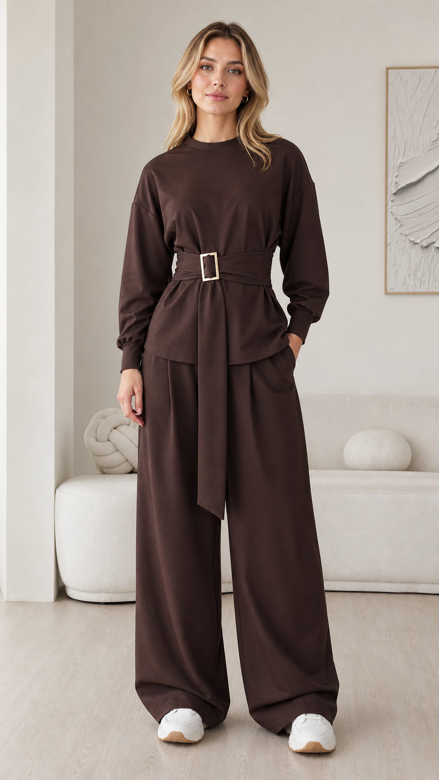Full front view of model wearing chocolate brown belted two-piece long sleeve top and wide leg pants set