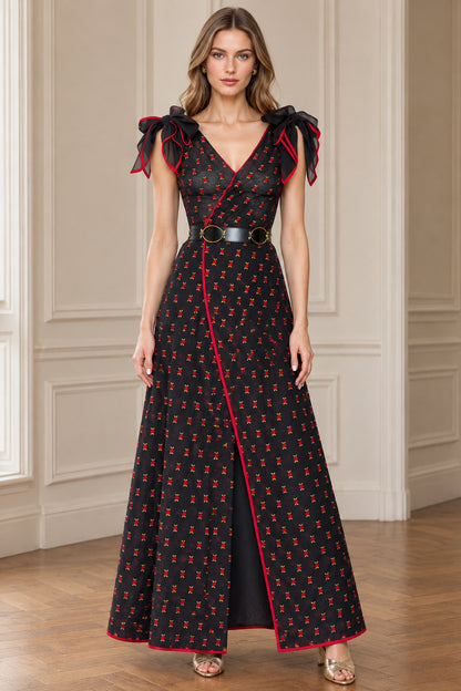 Front full view of black floral print V-neck maxi dress with red trim and bow shoulders
