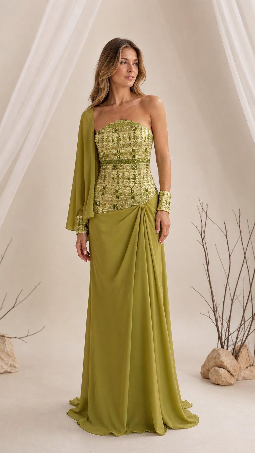 Front view of olive green strapless evening gown with embroidered bodice and side drape
