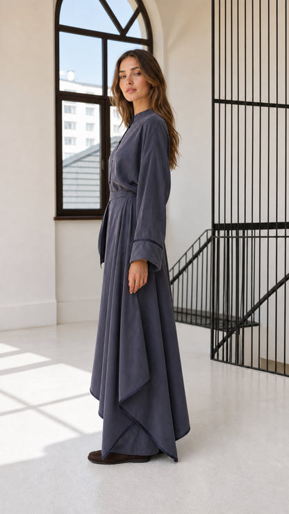 Side profile view of woman modeling slate blue flowing two-piece modest co-ord set