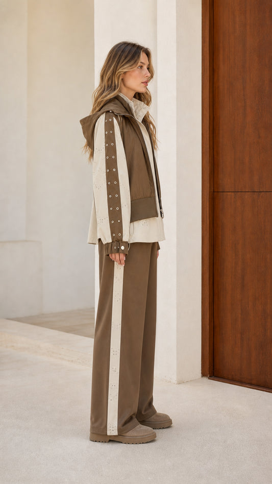 Side profile view of model wearing Khaki Contrast hooded utility jacket