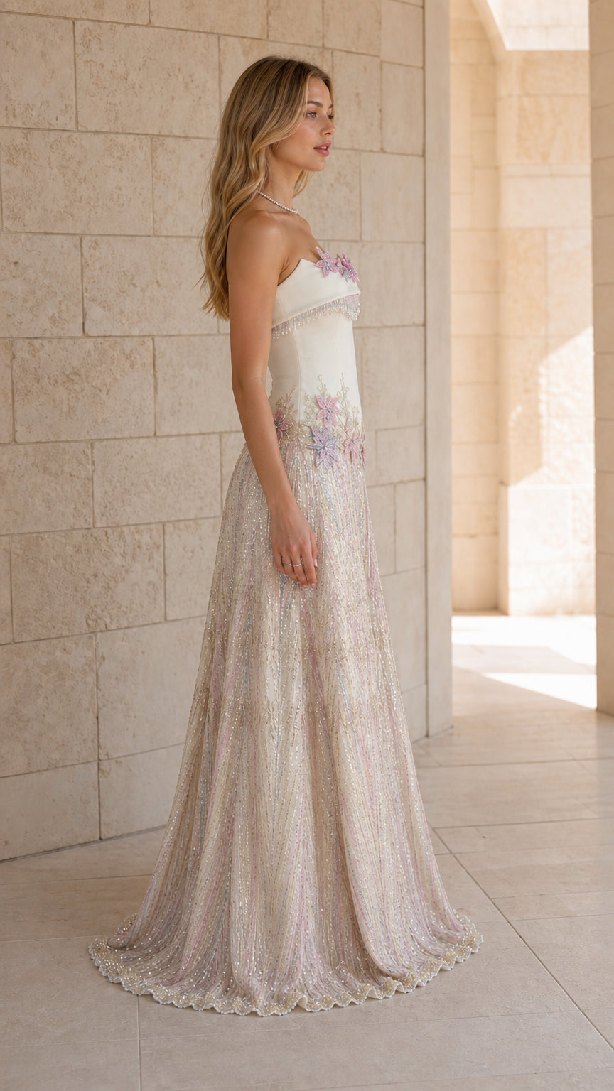 Side profile view of white formal gown