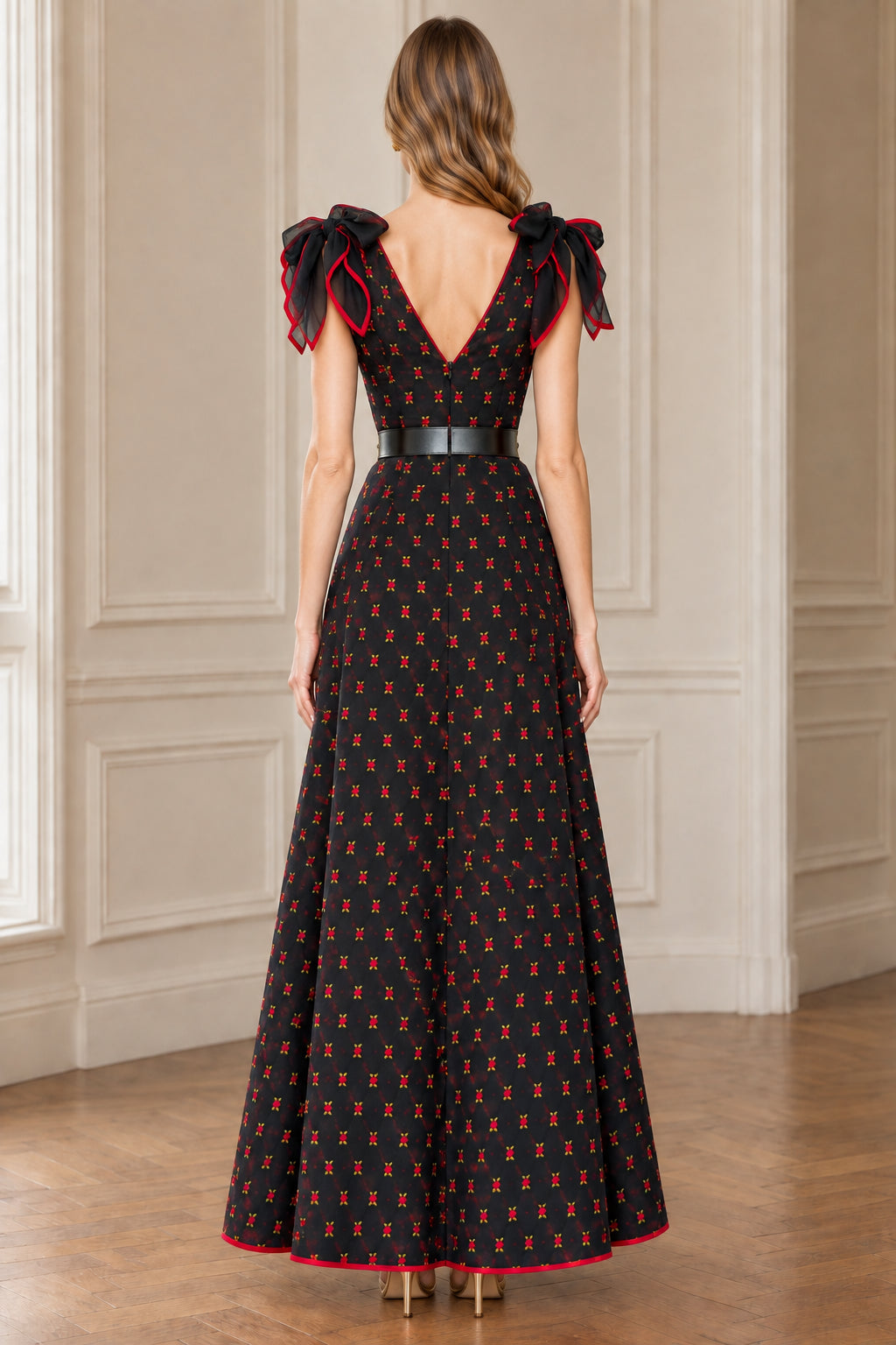 Back view of black floral maxi dress showing deep V-back and zipper