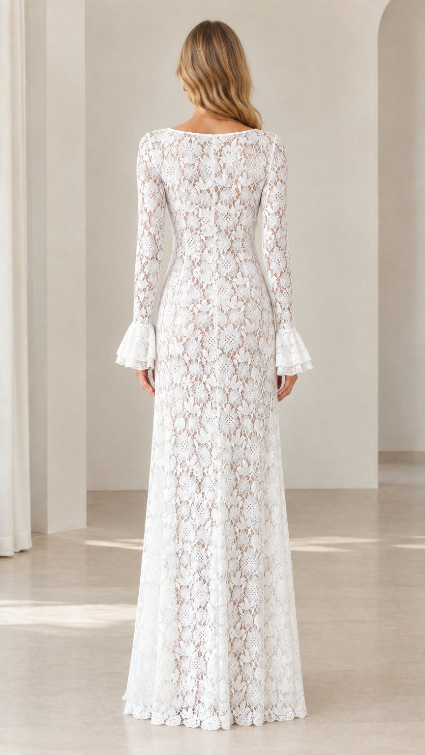 Back view of woman wearing floor-length white lace evening dress