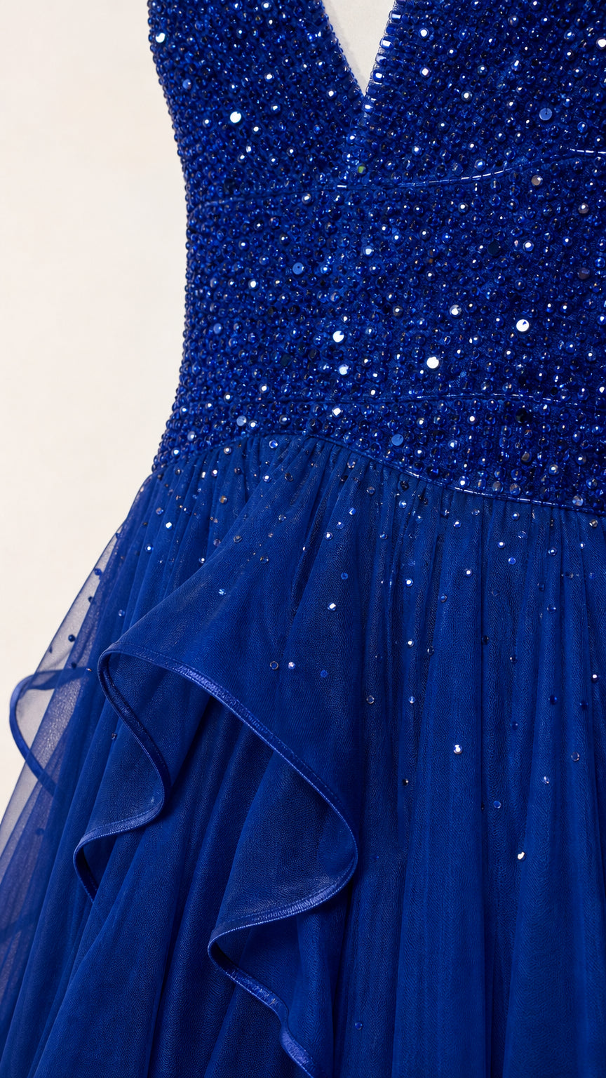 Close-up detail of Royal Blue sequined and beaded bodice with ruffle accents