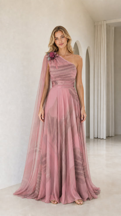 Full front view of dusty rose pink one-shoulder chiffon cape maxi dress