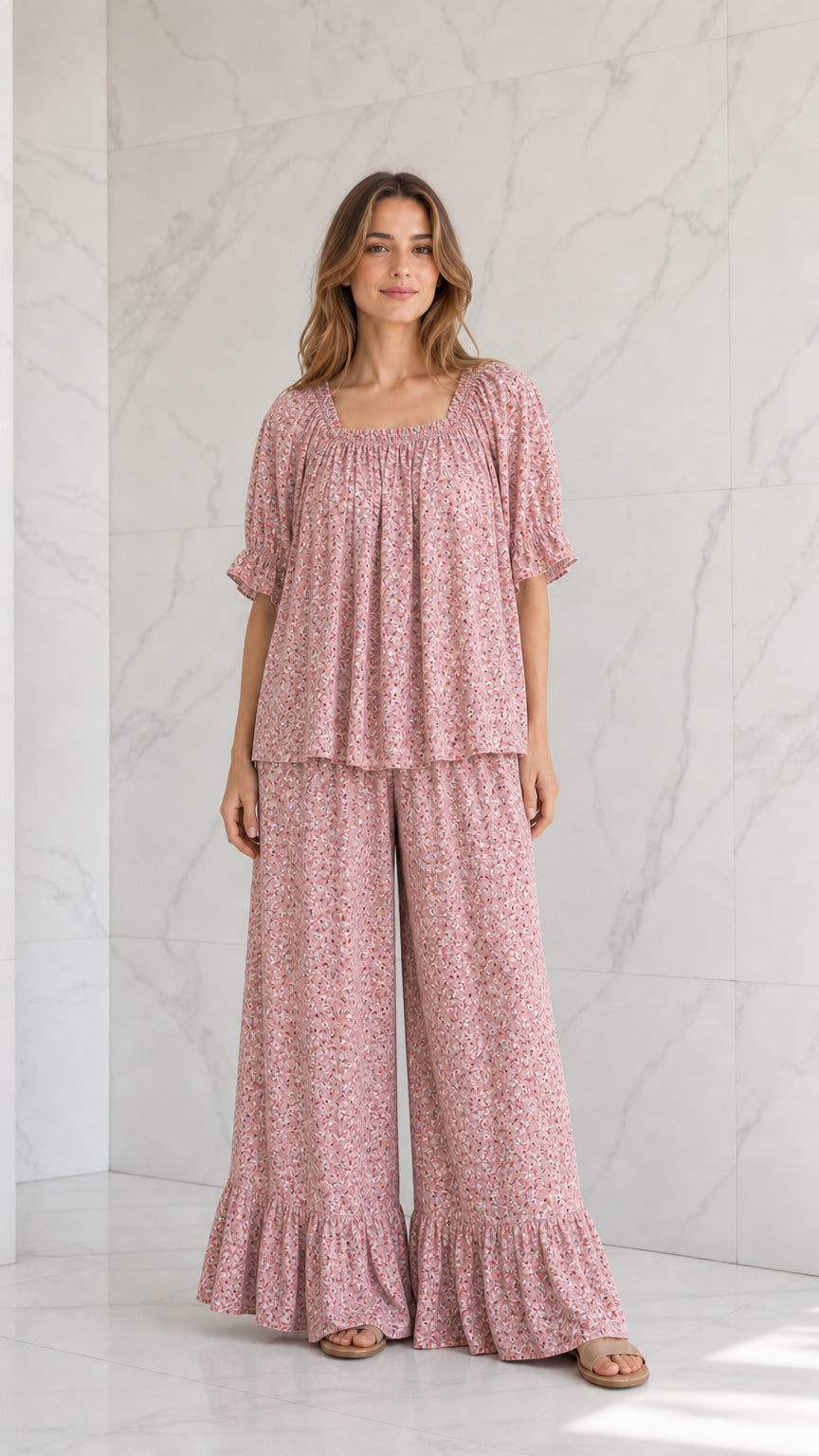 Model wearing dusty pink ditsy floral two-piece wide-leg pants set