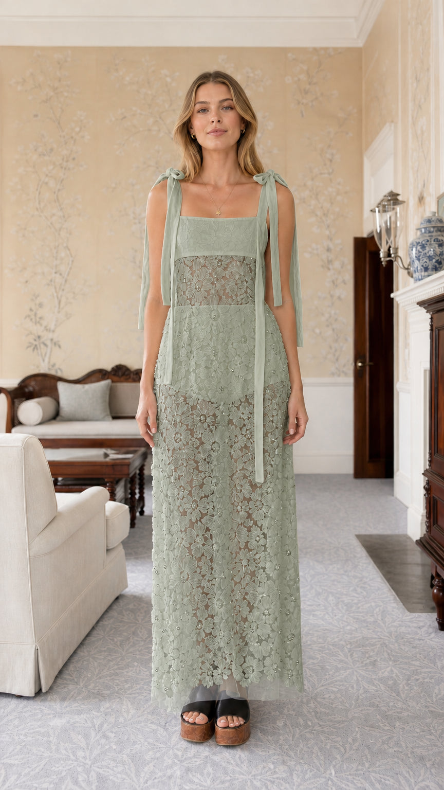 Front view of sage green tie-strap lace maxi dress