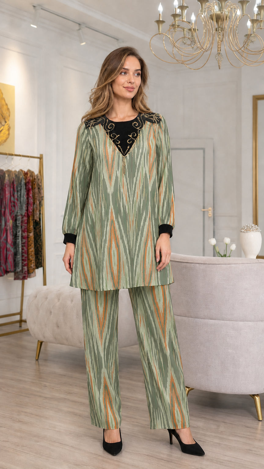 Model wearing Sage Green embroidered tunic and matching straight-leg pants