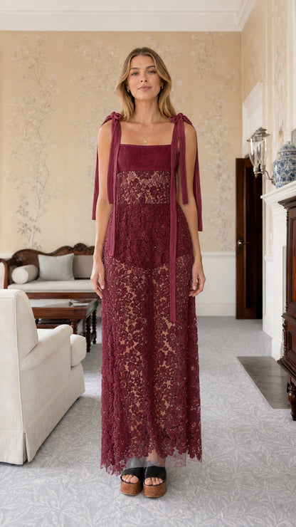 Front view of burgundy tie-strap lace maxi dress