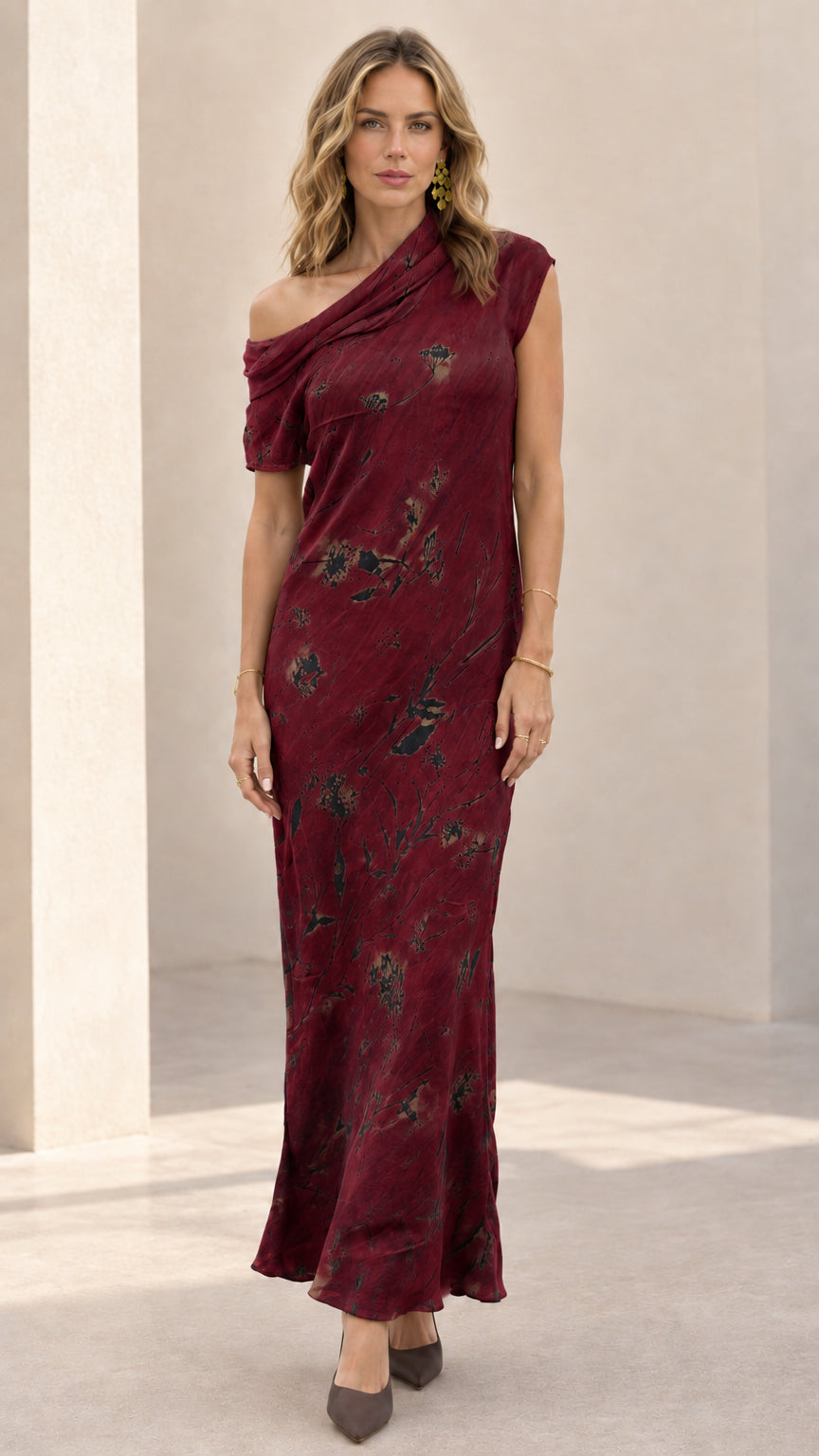 Burgundy botanical print asymmetric draped maxi dress on model