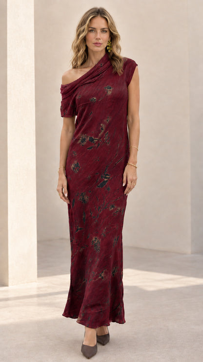 Burgundy botanical print asymmetric draped maxi dress on model
