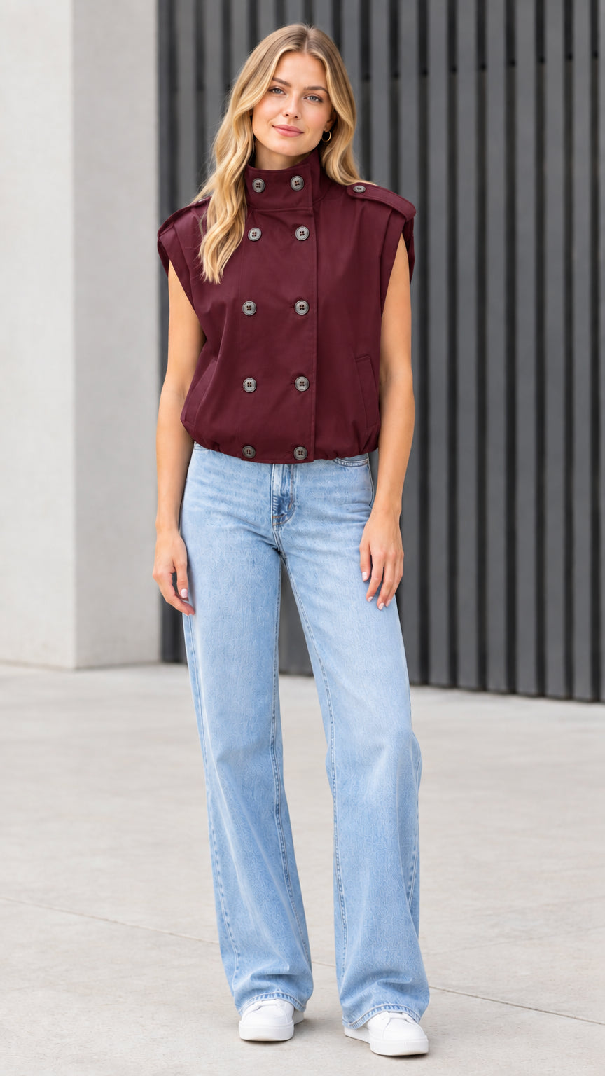 Front view of model wearing burgundy wine red double-breasted utility vest