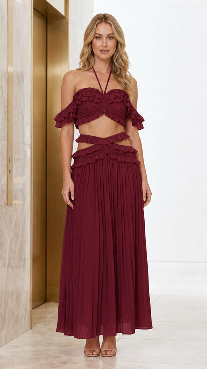 Front view of model wearing burgundy color variant