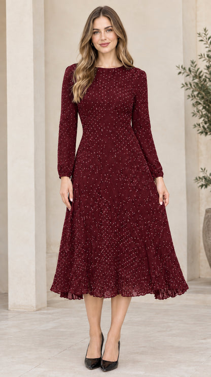 Front view of woman wearing burgundy wine red long sleeve micro dot A-line midi dress