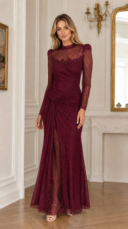 Full front view of a woman wearing a rich burgundy wine long sleeve lace evening dress