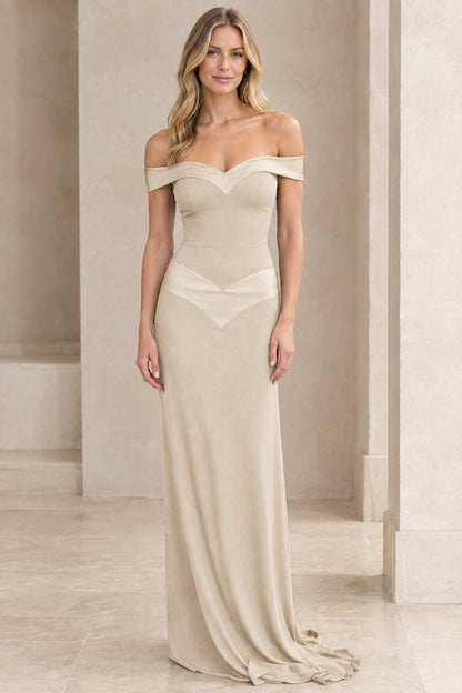 Model wearing champagne beige off-the-shoulder floor-length gown front view