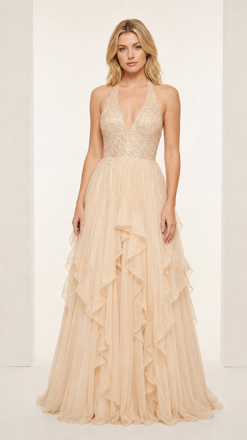 Front view of Champagne gold halter beaded tiered ruffle formal maxi dress