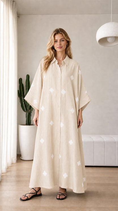 Beige cream loose-fitting embroidered maxi shirt dress on model